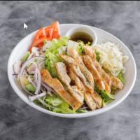 Grilled Chicken Salad · Juicy pieces of grilled boneless chicken breast sauteed with fresh garlic. (Serve with homem...