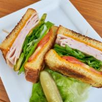 Club Sandwich · Oven-roasted turkey, applewood smoked bacon, ham, cheese, lettuce, tomato, and mayo. Served ...