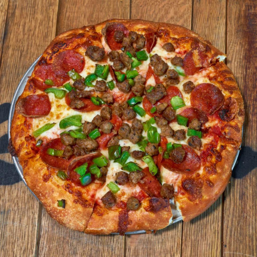 Build Your Own Pizza · Build your own with 3 toppings. Choice of toppings-cheese, pepperoni, sausage, ham, onion, green pepper, olives, jalapeno, and mushrooms.