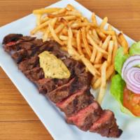 New York Strip · Tender, flavorful New York strip steak, cooked to perfection. Served with a side salad and v...