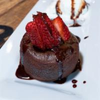 Molten Lava Cake · Our warm dark chocolate cake filled with a gooey molten chocolate truffle.