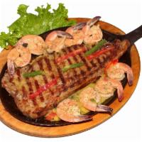 Surf and turf - MAR Y TIERRA · Sirloin Steak, Shrimp, white rice, beans, and salad - CHURRASCO, CAMARONES, ARROZ BLANCO, FR...