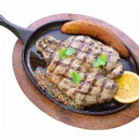 Grilled Sirloin Steak - CHURRASCO · Grilled sirloin steak, sweet plantain, white rice, beans and salad - CHURRASCO, MADURO, ARRO...