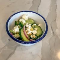Small Smashed Cucumbers · Feta, avocado, cashews, red onion, mint, tossed with a red wine vinaigrette. Vegetarian, Glu...