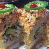Golden Tiger Roll · In: shrimp tempura, avocado, and cream cheese (deep fried). Out: spicy crab meat, jalapeno.