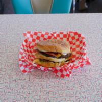 The Big Beeper · Two 1/4 lb. patties, charbroiled, served on a sesame bun with lettuce, tomato, onion, pickle...