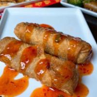 Egg Roll · Cabbage, peanuts, and pork.