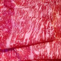 Raw Premium Lean Wagyu Kobe Beef · Thinly freshly sliced marbled lean Wagyu beef