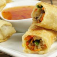 Veggie Egg Roll 2pc · Shredded cabbage, carrots and glass noodles. Deep fried served with sweet plum sauce.