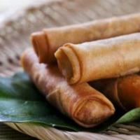 Pork Egg Rolls 2 pc · Shredded cabbage, carrots, glass noodle, and pork. Wrapped in egg roll wrapper deep fried. S...