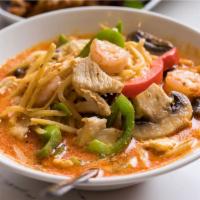 Gang Gai  · Bell pepper, mushroom and bamboo shoots stir fry with red curry and coconut milk. Gluten free.