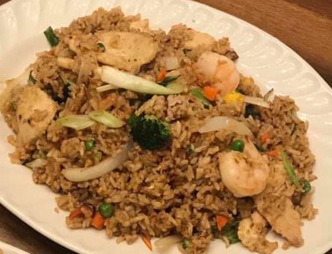 Bangkok Fried Rice  · House special fried rice. Shrimp, chicken, broccoli, peapod, onion, peas, carrots and egg.