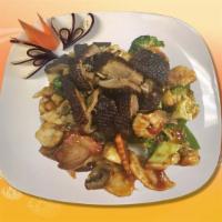 S2. House Special Duck · A savory blend of shrimp, chicken and roast pork sauteed with vegetable and topped with duck...