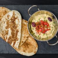 Hummus Dinner · Crushed chickpeas, tahini paste and house special seasoning.