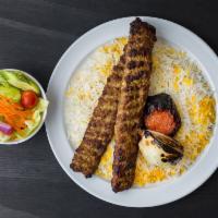 Koobideh Kebob Dinner · 2 skewers of chopped beef char-grilled on our open-flame grill. Served with basmati rice, gr...