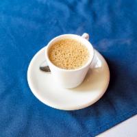 Masala Chai Tea · Indian tea brewed with aromatic spices- cardamom, cinnamon and cloves and milk.