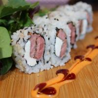 Beef Roll · Seared steak with cream cheese topped with spicy mayo and brown sauce.