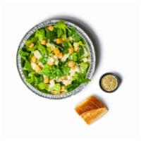 Caesar Salad · Romain, croutons, Parmigiana, provolone. Caesar dressing served on the side.