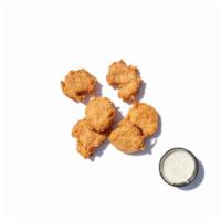 Vegan Chicken Nuggets  · Delicious fried vegan chicken nuggets with a choice of vegan blue cheese, ranch or hot sauce...