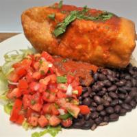 Marinated Pork Chimichanga · A crispy deep-fried Burrito filled with
Cheese and topped with Queso or
Enchilada Sauce. Ser...