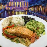 Grilled Salmon Fajita · Served over rice with Sautéed Onions,
Sweet Bell Peppers, Tomatoes, 2 Flour
Tortillas, with ...