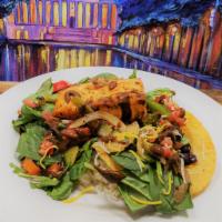 Grilled Salmon Tostada Salad · Two Crispy Corn Tortillas topped with Fresh Baby Spinach, Grilled Salmon, Tomatoes, Cheese, ...
