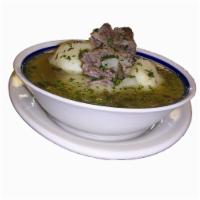 Caldo de Costilla · Beef stew. Served with rice and arepa.