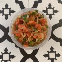 Pico De Gallo · Medium spicy Pico de Gallo made with fresh tomatoes, onion, garlic, jalapeño, cilantro, lime...