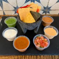 Small Side of Salsa and Chips · Small side of salsa (4oz) and Tortilla Chips.

Choice of:
Salsa Verde
Cilantro Dip
Pico de G...