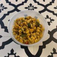 Roasted Corn and Peppers · Roasted Corn and  Peppers seasoned with black pepper and onion. 