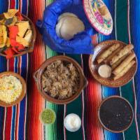 Family Meals · Includes: Mexican Rice (16oz), Charro Beans (16oz), Corn Tortillas (9), Crema (4oz) and Sals...