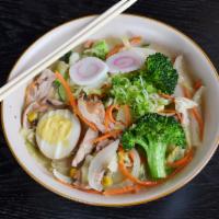 Wok Ramen · Ramen noodles in pork base broth served with stir fried vegetables, chicken, boiled egg, cor...