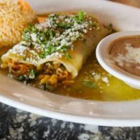 Enchiladas Rancheras · 2 enchiladas filled with a blend of shredded chicken, spinach, corn, and mushrooms cooked in...