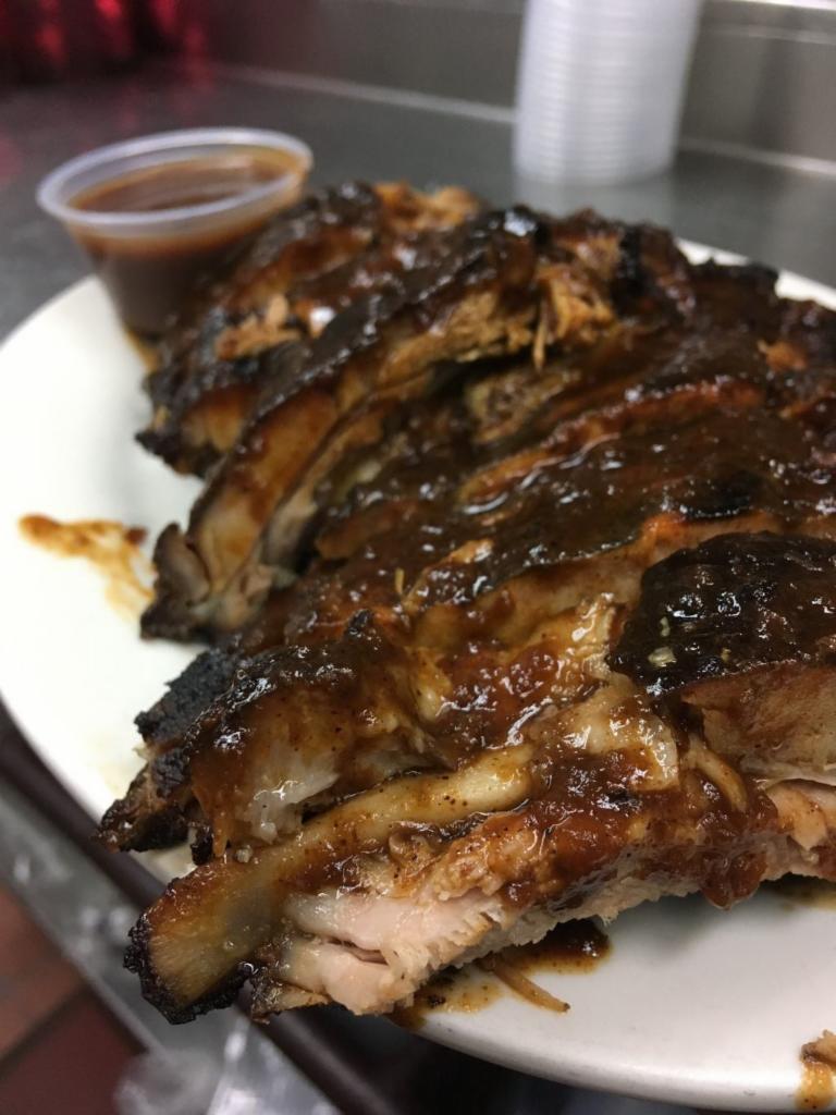 Half Rack BBQ Baby Back Ribs (app 5 ribs depending on weight) · Extras and additions to order must be done in sides category. Items added without a price will not be honored.