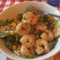 Southern Caesar Salad with Grilled Shrimp · Sweet roasted corn and diced red pepper topped with Parmesan croutons.