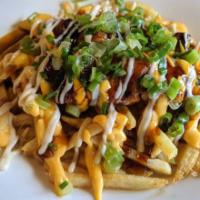 Yakitori Fries · Fries topped with chicken thigh, drizzled with cheese, mayo and yakitori sauce, topped with ...