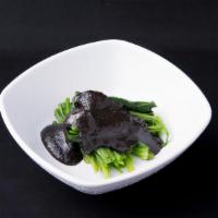 Goma Spinach · Boiled spinach, original creamy black sesame sauce, a sprinkle of black sesame seeds