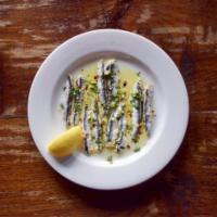 Alice Marinate al Limone · White anchovies, extra virgin olive oil, chili flakes, and lemon.