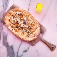 Focaccia · House-made freshly baked flat bread with fresh herbs, olive oil Trapini sea salt 
