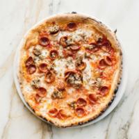 Americano Pizza · Salame picante, Italian sausage, fresh mozzarella, pomodoro, basil, and Grana Padano.