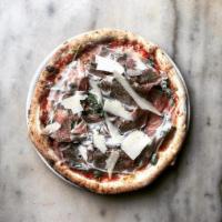 Dante Pizza · Smoked mozzarella, cherry tomatoes, prosciutto di parma, arugula, and shaved Grana Padano.