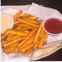 Sweet Potato Fries · Served with ketchup.