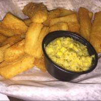 Yucca Frita · Crisp yucca served with our homemade corn sauce.