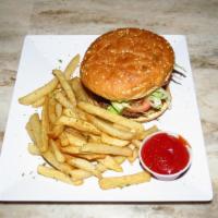 Tropix Big 1 Burger · 10 Oz. Angus burger topped with sliced onion, lettuce, tomato, and Tropix sauce. Accompanied...