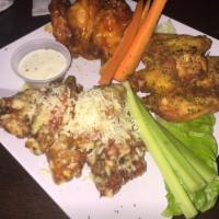 Tropix Wing Sampler · 15 jumbo wings served in your choice of 3 flavors with carrots, celery, and blue cheese.