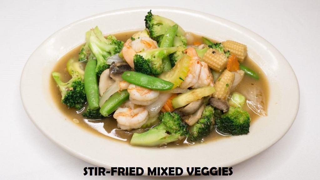 E12. Mix Vegetables · Sauteed broccoli, carrot, zucchini, snap peas, mushrom, yellow onion and baby corn in brown sauce.