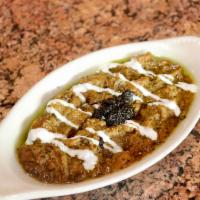 Kashk-e-Bademjoonn · Traditional style dip - sautéed eggplant and caramelized onions drizzled with kashk and drie...