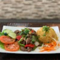 Shaking Beef Platter · Com bo luc lac. Stir-fried marinated cube filet mignon with garlic, bell peppers, and onions...