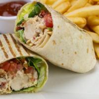 Chicken Club Wrap · Aged cheddar cheese, Applewood bacon, tomato, lettuce, mayo in a flour tortilla with ranch d...