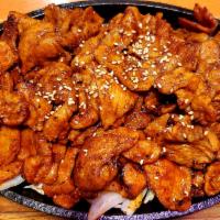 18. Dae Ji Bul Go Gi 돼지 불고기 · Thinly sliced pork grilled in Korean hot chili sauce.